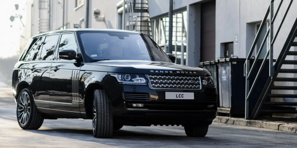private driver driving a range rover vogue